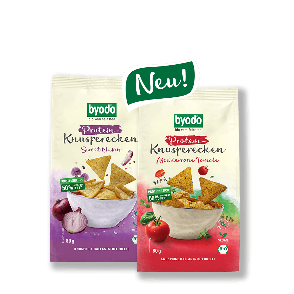 Links Protein Knusperecken Sweet Onion, rechts Protein Knusperecken Mediterrane Tomate mit Neu-Störer